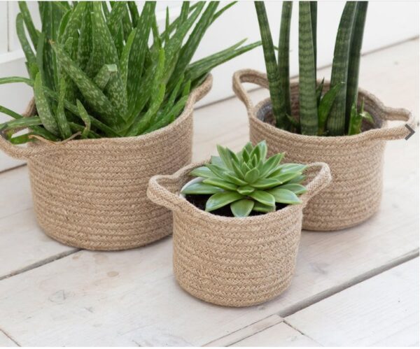 Set of three jute woven planter baskets in small, medium, and large sizes, perfect for plants or storage.