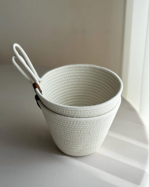 lose-up of handcrafted cotton rope baskets, ideal for small plants or organizing accessories