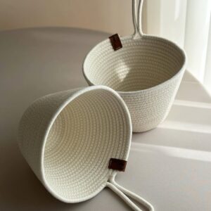 Set of 2 cotton rope planter baskets with a 6-inch diameter, featuring a convenient hanging loop for versatile use."