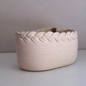 Elegant braided cotton rope storage basket used for organizing household item