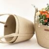 Handcrafted jute planter basket with handles Eco-friendly jute plant holder Stylish indoor planter basket Natural jute rope plant pot cover Rustic decorative planter basket Large jute planter with handles Small eco-friendly plant basket Indoor plant decor basket Boho-style jute planter Versatile jute basket for plants