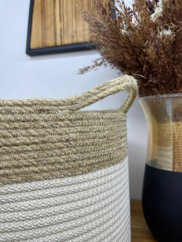 Cotton rope and jute planter basket holding an indoor plant.” “Two-tone cotton rope and jute basket used as a decorative plant holder.” “Eco-friendly cotton and jute basket for indoor plants or home storage.