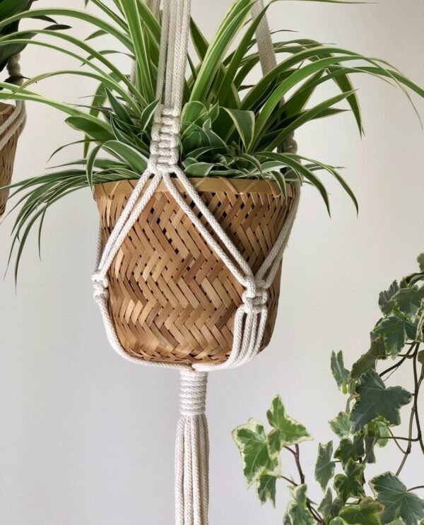 macramé planter hanger, boho plant holder, hanging plant hanger, handmade macramé plant hanger, indoor plant decor, boho home accessories, cotton macramé plant hanger, macramé hanging planter, eco-friendly plant hanger, boho hanging decor