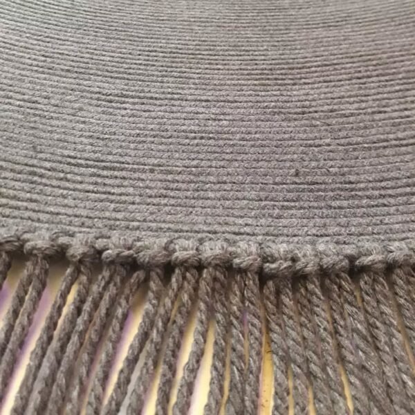 Black tassel rug Pakistan Cotton rope round rug Handmade round rug for living room Rope rug for bedroom floor Tassel floor mat online Pakistan Eco-friendly cotton rugs Karachi Lahore Minimalist black rug Cotton rope rug for home decor Round handmade rug with tassels Home decor rugs online shopping Pakistan