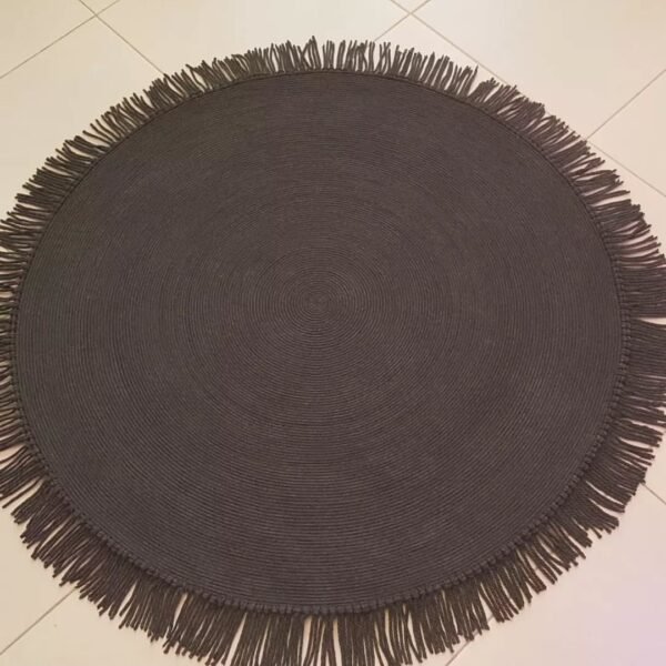 Black tassel rug Pakistan Cotton rope round rug Handmade round rug for living room Rope rug for bedroom floor Tassel floor mat online Pakistan Eco-friendly cotton rugs Karachi Lahore Minimalist black rug Cotton rope rug for home decor Round handmade rug with tassels Home decor rugs online shopping Pakistan