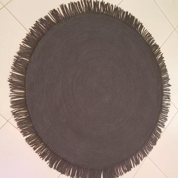 Black tassel rug Pakistan Cotton rope round rug Handmade round rug for living room Rope rug for bedroom floor Tassel floor mat online Pakistan Eco-friendly cotton rugs Karachi Lahore Minimalist black rug Cotton rope rug for home decor Round handmade rug with tassels Home decor rugs online shopping Pakistan
