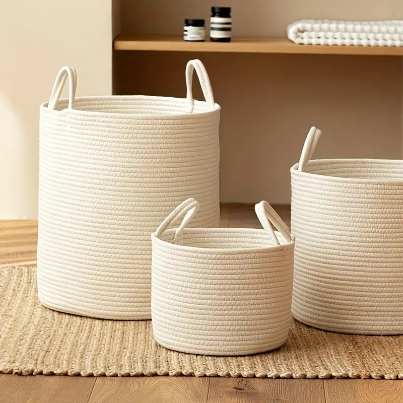 cotton rope storage basket, laundry basket with handles, toy storage bin, home organization basket, decorative storage baskets, cotton rope hamper, eco-friendly storage, collapsible storage basket, boho storage solution, modern home decor, basket for blankets, nursery organizer, farmhouse storage basket